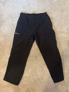 adidas Black women’s Jogger athletic pants with Side Stripes, size M
